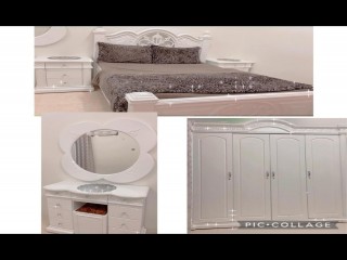 غرفة نوم مكونه من سرير وكبت وتسريحه و1 كوميدينه